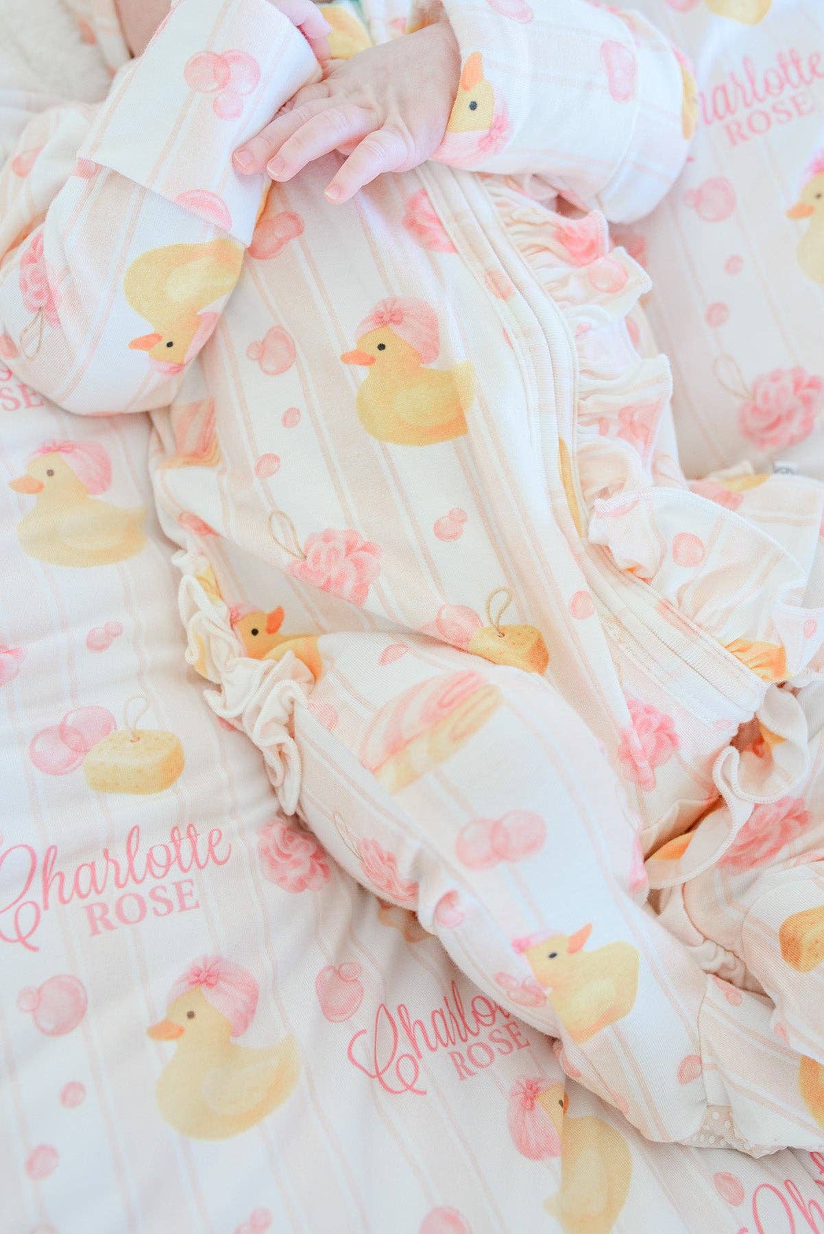 Ruffle Bamboo Zipper Footie | Bubble Duckies Pink