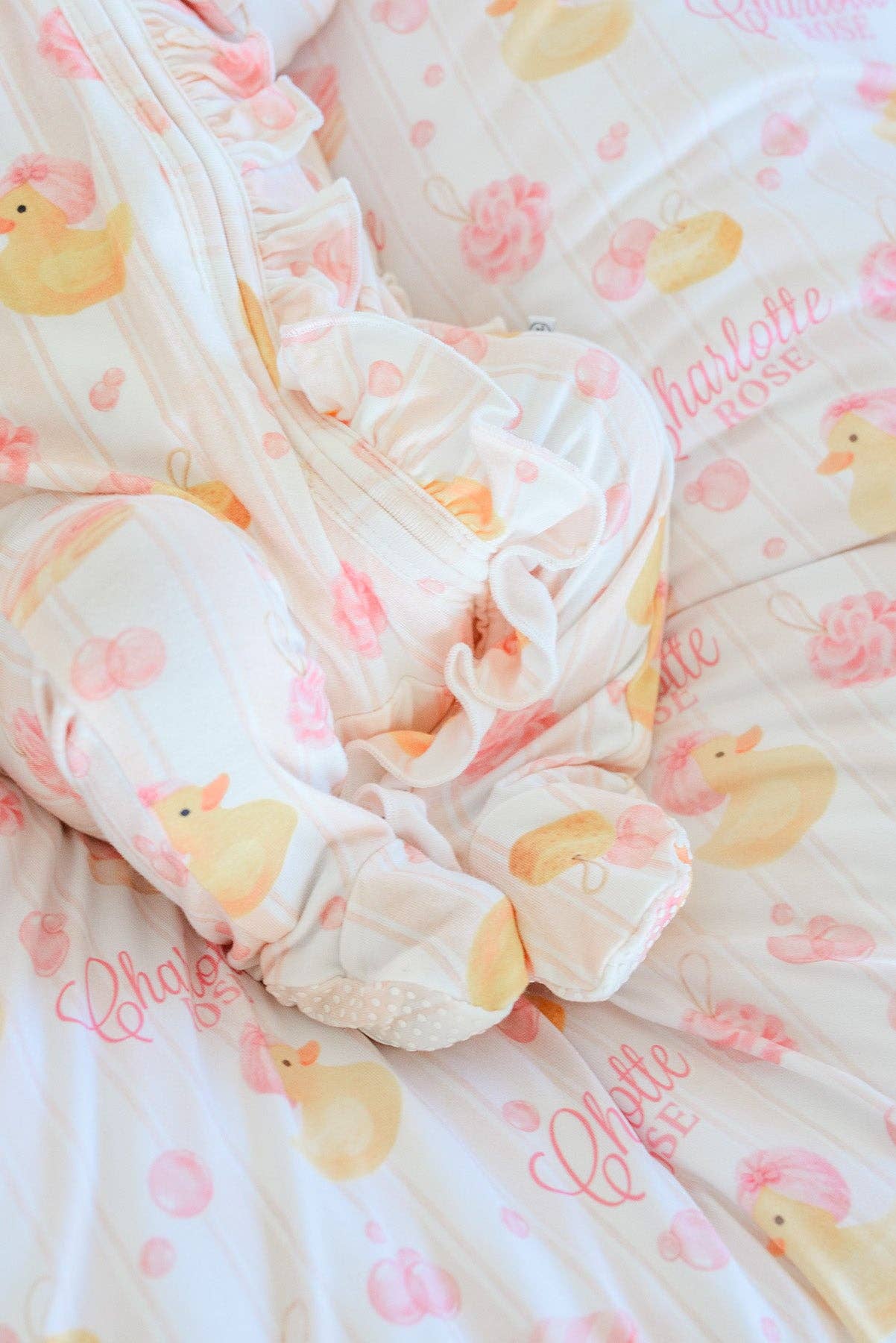 Ruffle Bamboo Zipper Footie | Bubble Duckies Pink